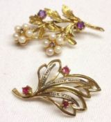 A hallmarked 9ct Gold Floral Spray Brooch set with Amethysts and Seed Pearls, approximately 4cm