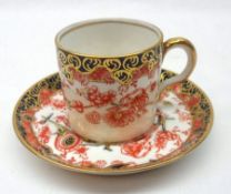 A set of ten Royal Crown Derby Coffee Cans and Saucers, typically decorated in Imari colours with