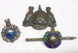 A packet of assorted items including Royal Marines Gibraltar Bar Brooch; two further Military
