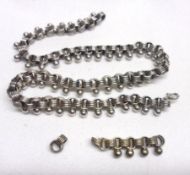 A late Victorian Continental white metal Curb Link and Beaded Necklet (some links detached)