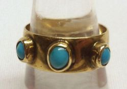 A hallmarked 9ct Gold wide band Ring, inset with three turquoise stones, weighing approximately