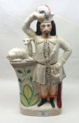 A 19th Century Staffordshire Flat Back Figure standing beside a pedestal with a seated lamb,