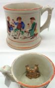 A Staffordshire Frog Mug, the interior with a puce and brown speckled frog and the outer body