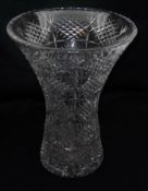 A heavy Lead Crystal large Trumpet Vase, heavily facetted throughout and raised on a star cut