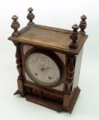 An early 20th Century Walnut and Porcelain Cased Mantel Clock, Winterhalder & Hofmeier, the plinth-