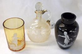 A small Amber Glass Beaker, a further black Glass baluster Vase and a small ovoid Decanter (repair