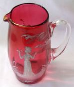 A Cranberry Glass Jug with clear handle, painted in the manner of Mary Gregory with a young girl