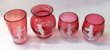 Two Cranberry Glass Salts painted in the manner of Mary Gregory with typical scenes of children,