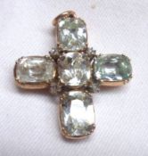 A Victorian yellow metal framed light blue stone set Cross, measuring approximately 30mm x 25mm