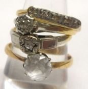 A group of four Rings viz:  a hallmarked 22ct Gold Ring set with a white stone, a high grade