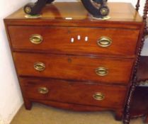 A 19th Century Mahogany Chest of three full width drawers on bracket feet, crossbanded and