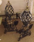 A pair of Ornate Heavy Cast Metal Andirons, crested with copper/brass mounts, 28” high