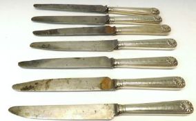 A set of seven Victorian Silver handled Dinner Knives in thread and shell pattern, Sheffield