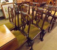 A set of six Chippendale style Mahogany Dining Chairs, all with foliate crested and scroll