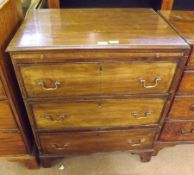 An early 19th Century Mahogany Bachelors Chest with moulded edge, over a brushing slide, three
