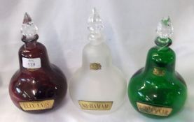 A collection of three 20th Century Liquor / Scent / Drug Jars including:  a green Jar with clear