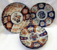 A collection of four Japanese Imari Plates of circular form with crimped rims, all approximately