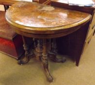A Victorian Walnut Fold Top Card Table of demi-lune form, inlaid with boxwood stringing and neo-
