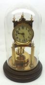 An early/mid-20th Century Brass Year-Going Timepiece by Becker with revolving pendulum, under
