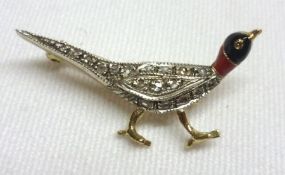 An attractive mid-grade yellow metal Brooch formed as a pheasant, set with small rose cut Diamonds