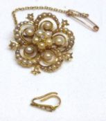 An Edwardian period openwork shaped circular Brooch, set throughout with Seed Pearls and with