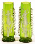 A pair of Green Glass Vases of spreading circular form, with clear glass prunt borders and each
