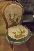 A Victorian Satinwood Nursing Chair with grospoint wool upholstered back, carved with rosettes and