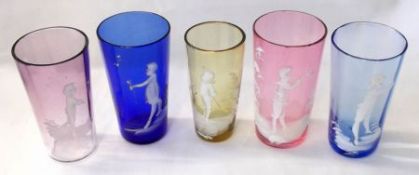A small collection of five various coloured Glasses decorated in the manner of Mary Gregory