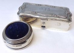 A George V Silver encased Ring Box of shaped rectangular form, the top with reeded and floral