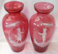 A pair of large Cranberry baluster Vases, decorated in the manner of Mary Gregory with motifs of a