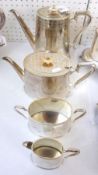 A Victorian four piece Electroplated Tea and Coffee Service of tapering oval form, well engraved