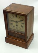 A late 19th Century Oak Cased Timepiece of plain rectangular design, Roman numerals to a cream