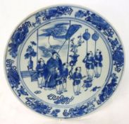 An Oriental Circular Charger, painted in underglaze blue with scene of magistrate and attendants,