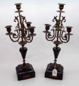 A pair of late 19th Century Gilt Spelter and Black Slate Candelabra, each of four light construction