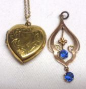 An Edwardian 9ct Gold Framed Openwork Pendant, in Art Nouveau style, featuring two blue stones,