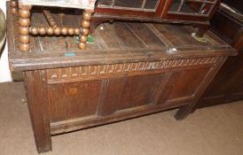 An 18th Century Oak Coffer, three panel top and front and plain stile supports, 49 ½” wide