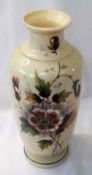 A French Glass Baluster Vase, decorated in shades of ochre and green with a panel of foliage on an