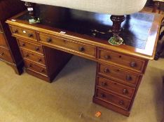 A late 19th Century Mahogany Twin Pedestal Desk, with rexine inset over three frieze drawers, and