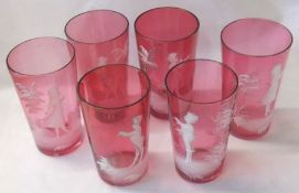 A collection of six Cranberry Glass Tumblers, all painted in the manner of Mary Gregory with