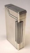 A Vintage Dunhill unmarked white metal Cigarette Lighter, rectangular shaped with engine turned