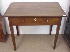 An 18th Century Oak Side Table with plain top and Ebonised strung full width frieze drawer with