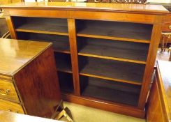 A Mahogany Bookcase of rectangular form with moulded edge, fitted on either side with sections of