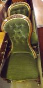 A pair of Victorian Walnut Spoon Back Ladies Chairs, upholstered throughout in green button back,