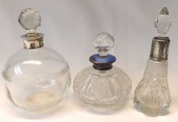 A Mixed Lot comprising: three various Silver mounted and Clear Cut Glass Toiletry Bottles, each with