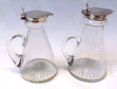 Two similar conical glass Whisky Tots, with hinged hallmarked Silver lids, each approximately 4”