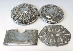 A Mixed Lot comprising:  Two embossed circular Toiletry Bottle Lids, Edwardian curved rectangular
