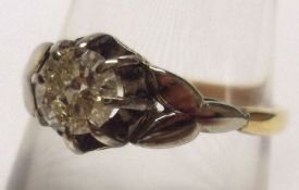 A yellow metal Ring with claw set Solitaire brilliant cut Diamond of approximately .4cts (