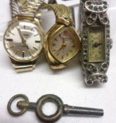 A Mixed Lot comprising: a Base Metal Cased Cocktail Watch; together with a two further Ladies Gold