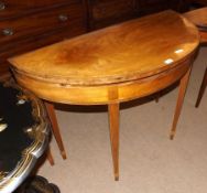 A late 18th/early 19th Century Mahogany Fold Top Card Table, the hatched crossbanded top with