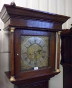 A late 18th Century Oak Cased 8-Day Longcase Clock, overhanging cornice to freestanding later parcel